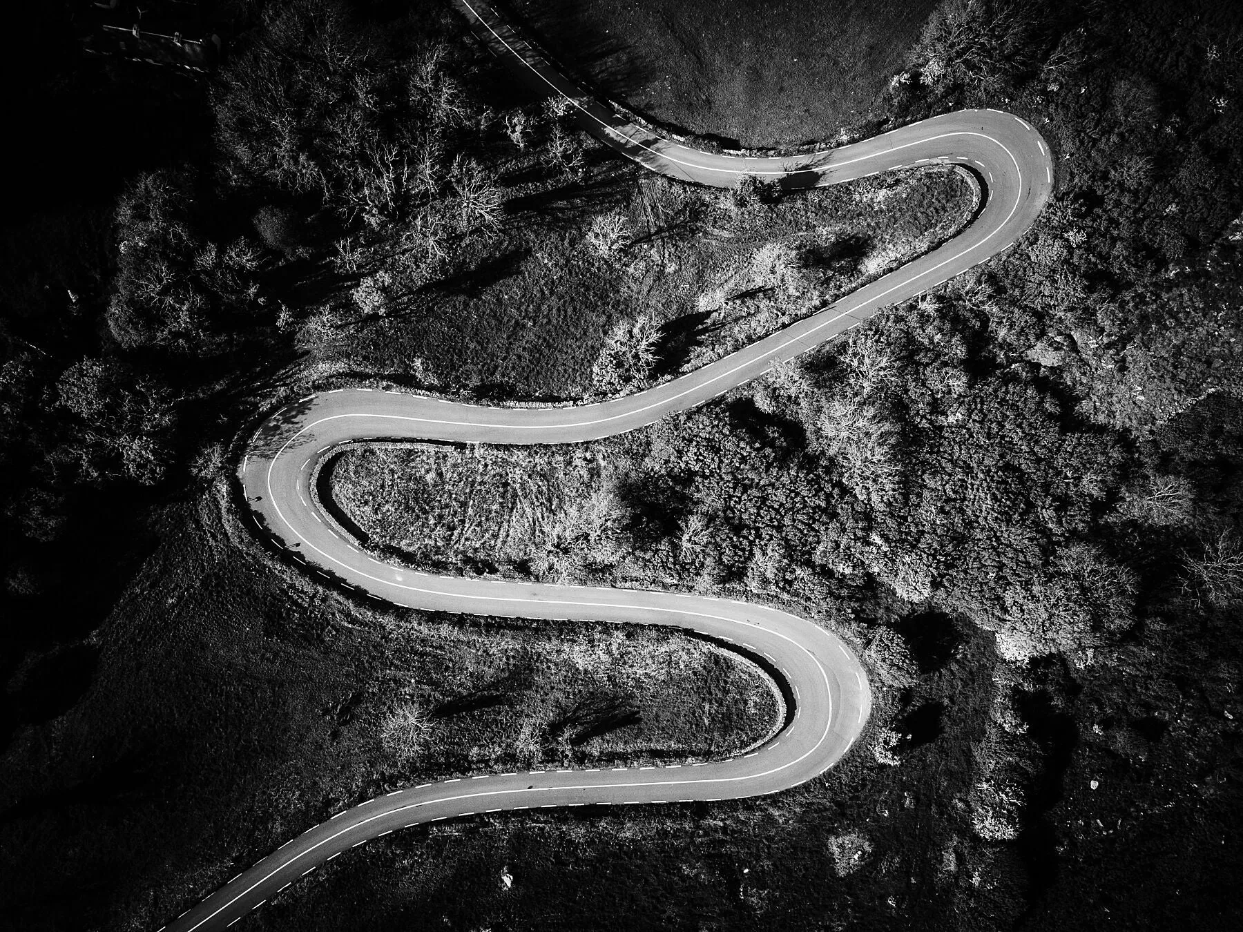 Winding it's way up through the Burren, the Corksrew Hill is fun on motorbike and unmistakeable from above.
