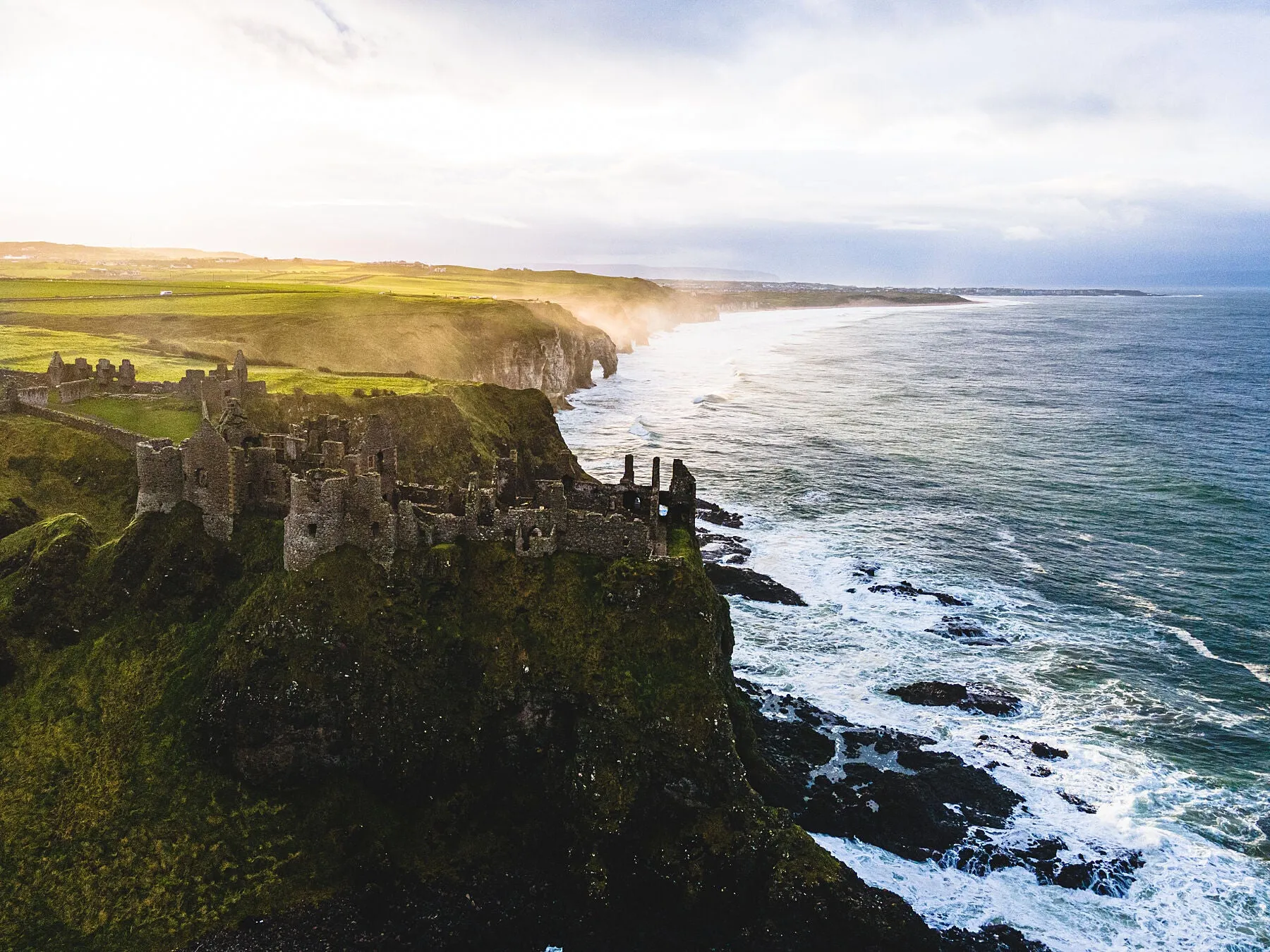 Ireland has no shortage of castles, but Dunluce - a medieval castle close to the Giants Causeway - is one of the more dramatic I've seen. Seen here on a wild wintery evening.